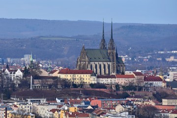 Naklejka premium The city of Brno, Czech Republic-Europe. Top view of the city with monuments and roofs. Church Petrov.