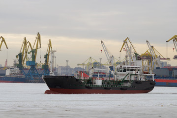 A huge ship with cargo.