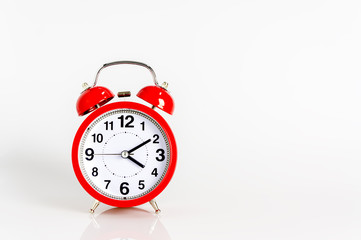 Alarm clock close up isolated on white background. Copy space for text.