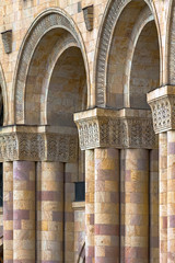 Classic column and arch, ornament is carved in stone. Armenia