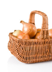 Fresh onions in basket