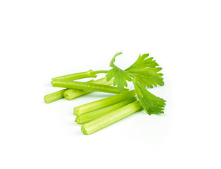 fresh celery on white .