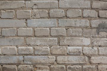 Grey brick wall with cement texture background