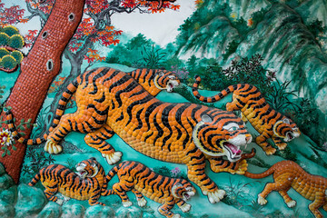 Tigers on a wall in a Chinese shrine