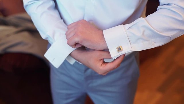 Unrecognizable man wearing cufflinks closeup