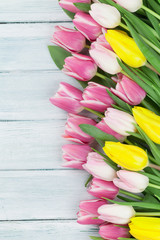 Easter background with colorful tulips