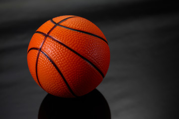 Ball basketball on black background.