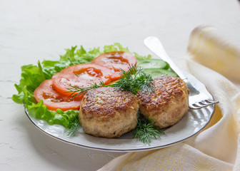 Fried cutlets  and vegetable.