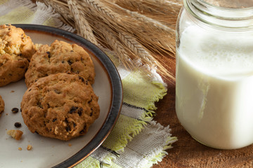 close up view of nice homemade cookies with milk