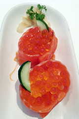Sushi set Japanese rice roll with raw fish and salmon eggs