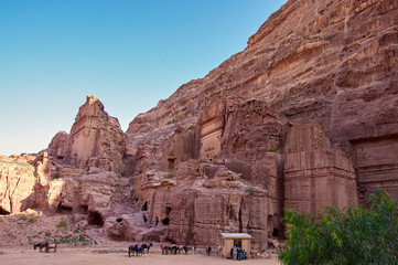 The street of facades. Ancient Nabataean city - Petra also known as Rose city or Raqmu. Jordan.