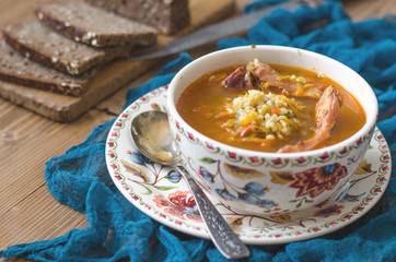 Tomato soup with bulgur carrot and smoked ribs