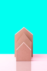 three house model cardboard with free copyspace house loan business concept