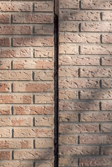 Vertical expansion joint makes allowance for thermal expansion of the parts joined without fracture or fissure. Dilatation joint between two blocks of buildings