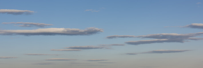 Fototapeta premium Long Slender Clouds in Evening Sky