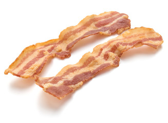 cooked crispy slices of bacon isolated on white background