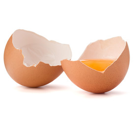 Broken egg  in eggshell half isolated on white background cutout