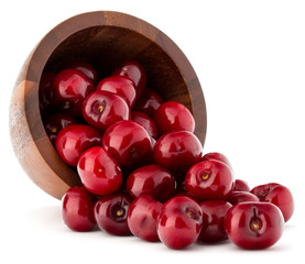 cherry berries in wooden bowl