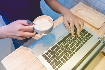 business trading concept : man trade stock and forex in notebook