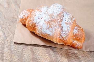 Tasty puff pastry with powdered sugar
