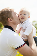 Obraz premium Dad and son on the nature,