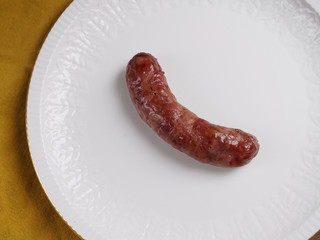 Roasted creole sausage in a plate