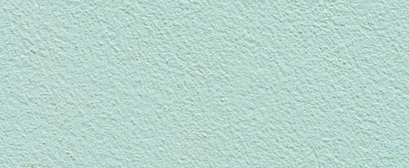 Blue paint cement wall texture can use for background or cover. Panoramic banner.