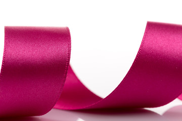 Pink ribbon on white