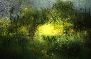 Rain drops on a window glass.