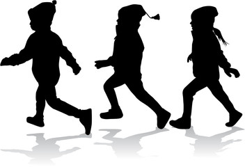 Silhouettes of children running.