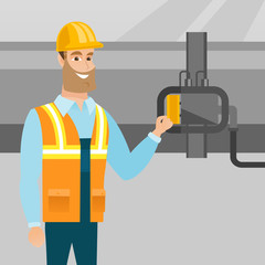 Operator checking detector on gas pipeline.