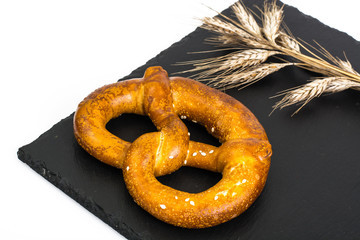 Bavarian pretzels on black stone