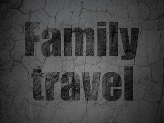 Vacation concept: Family Travel on grunge wall background