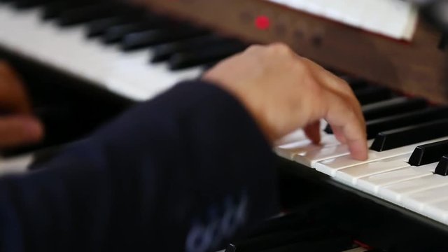 musician hands electric piano organ pianist plays music