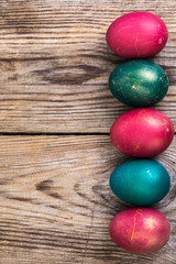 Fototapeta na wymiar Easter eggs blessed on old wooden boards