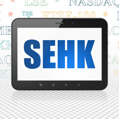 Stock market indexes concept: Tablet Computer with SEHK on display