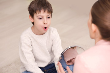 Cute little boy at speech therapist office