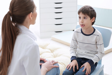 Fototapeta premium Cute little boy at speech therapist office
