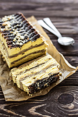 Ice cream pistachio cake with chocolate on wooden background