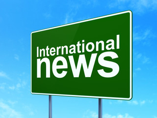News concept: International News on road sign background