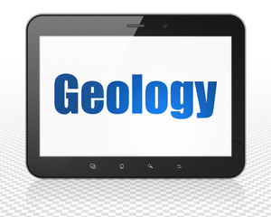 Studying concept: Tablet Pc Computer with Geology on display