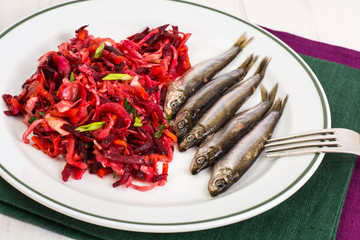Sprats and vegetable salad