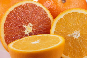 Juicy ripe orange slices on the background