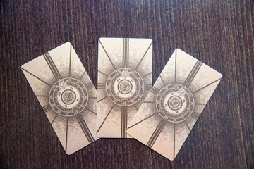 Tarot cards on the wood. Labirinth tarot deck. Esoteric background.