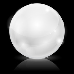 White glass ball with reflection on black background