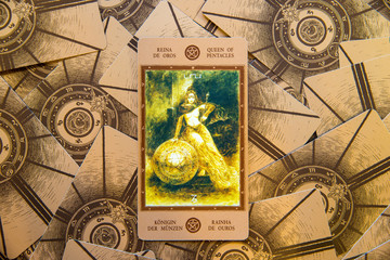 Fototapeta na wymiar Tarot card Qeen of Pentacles. Labirinth tarot deck. Esoteric background.