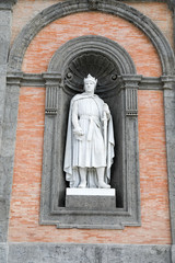Fototapeta premium statue on facade of the Palazzo Reale