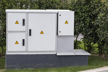 Outdoor plastic electrical cabinet with warning signs