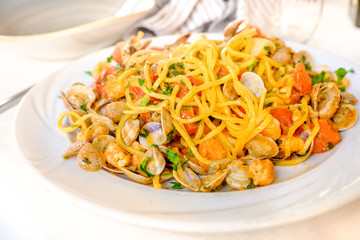 spaghetti alla chitarra  or spaghetti allo scoglio with clams shrimps italian seafood recipe