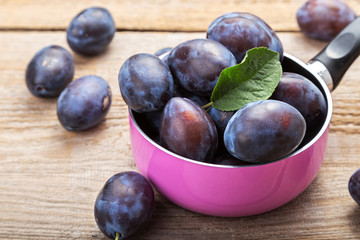fresh plums on the table